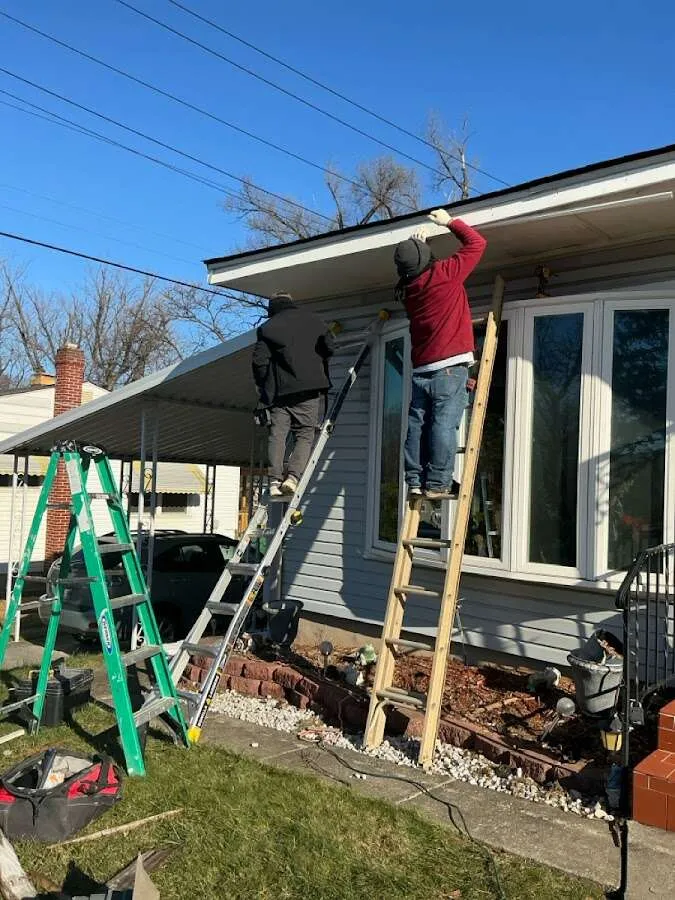 Restoration crew performing exterior repair in Larkspur